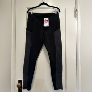 NWT Nike Black and Gray leggings, Mid Rise with side pockets MSRP $75